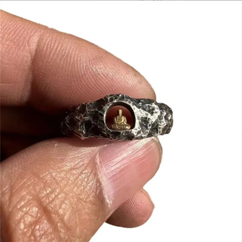 Hand-forged copper ring with a grotto Buddha design and textured rock finish, shown in size 8.