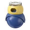 Yellow and blue plastic tumbler owl cat puzzle feeder for self-service food dispensing.