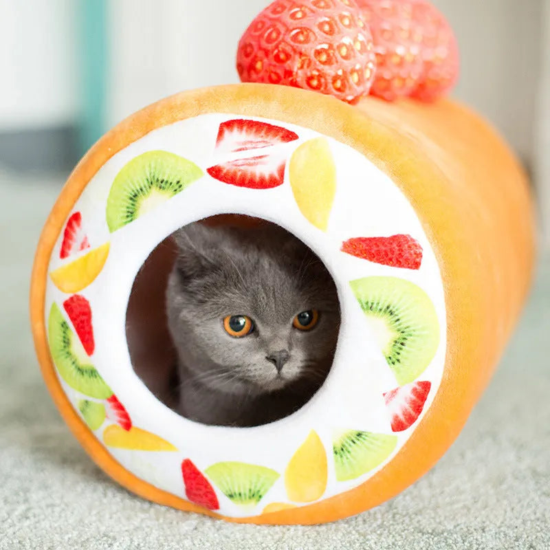 Yellow cake roll plush cat toy 40cm long on plain background