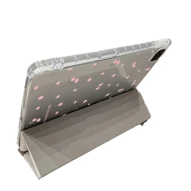 Transparent floral patterned iPad case with tri-fold magnetic stand open