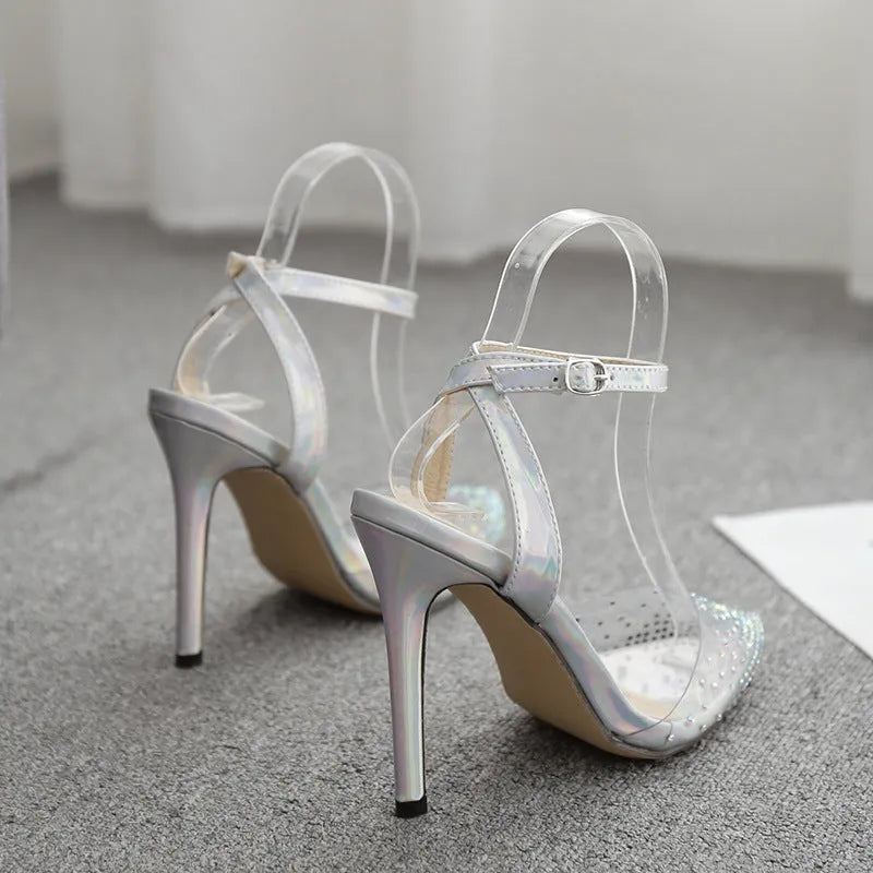 Women's pointed toe sandals with stiletto heels, diamond detail on PVC upper, shown on a size chart.