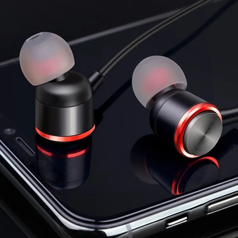 Wired in-ear headset with 3.5mm plug, TPE cable, and silicone ear caps in black colour