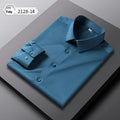 Man wearing a solid colour long-sleeved non-ironing shirt made from elastic polyester spandex fabric.