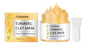 Yellow turmeric mud mask jar and brush for face application.