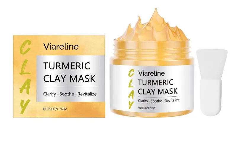 Yellow turmeric mud mask jar and brush for face application.