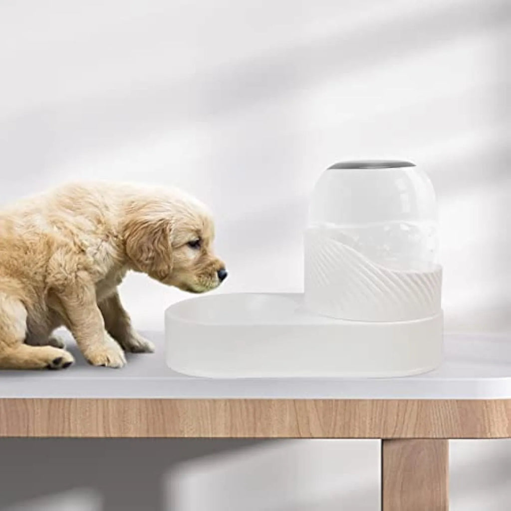White gravity cat feeder and water dispenser set with wave-shaped design, 2L capacity each.