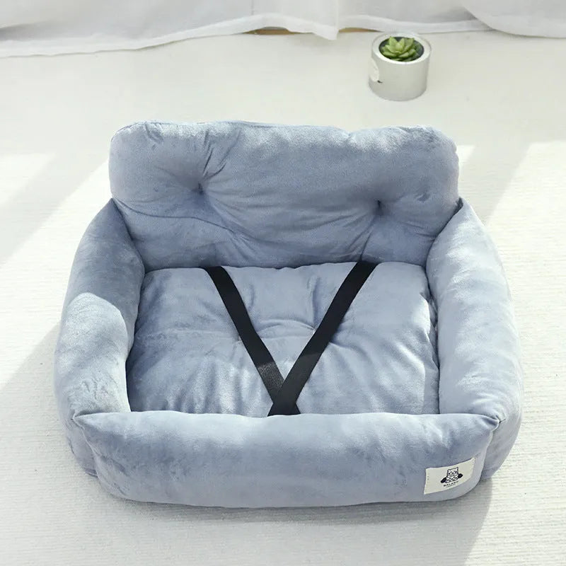 Grey and blue plaid cloth dog car travel nest shown on a car seat, with small and large size options.