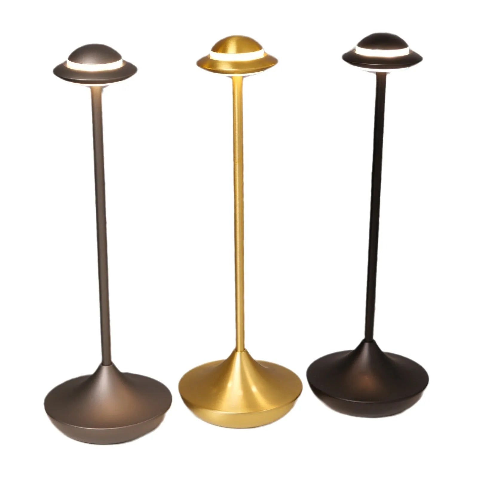 Modern metal UFO-shaped desk lamp in black on a wooden table, showing touch controls.
