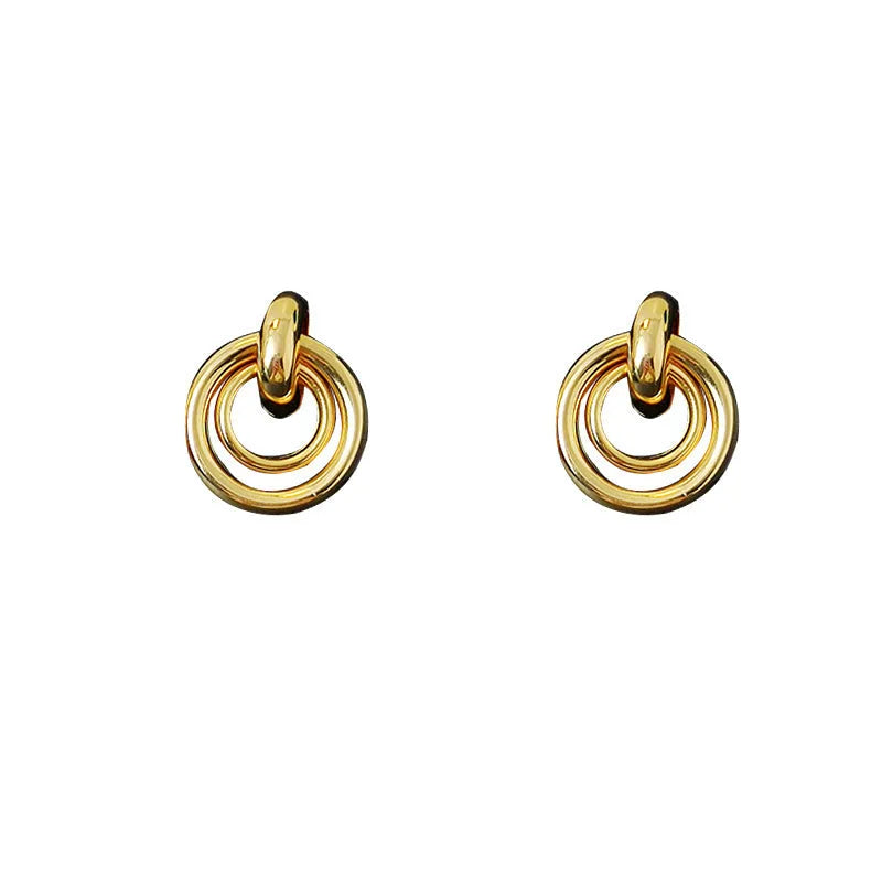 Geometric round ring earrings with irregular design in gold and silver electroplated finishes