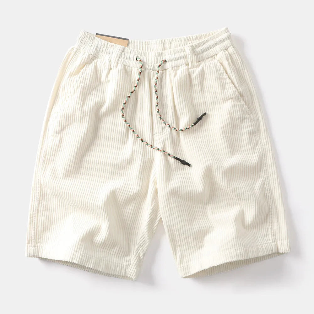 Man wearing khaki retro-style American cargo shorts made from polyester fabric.