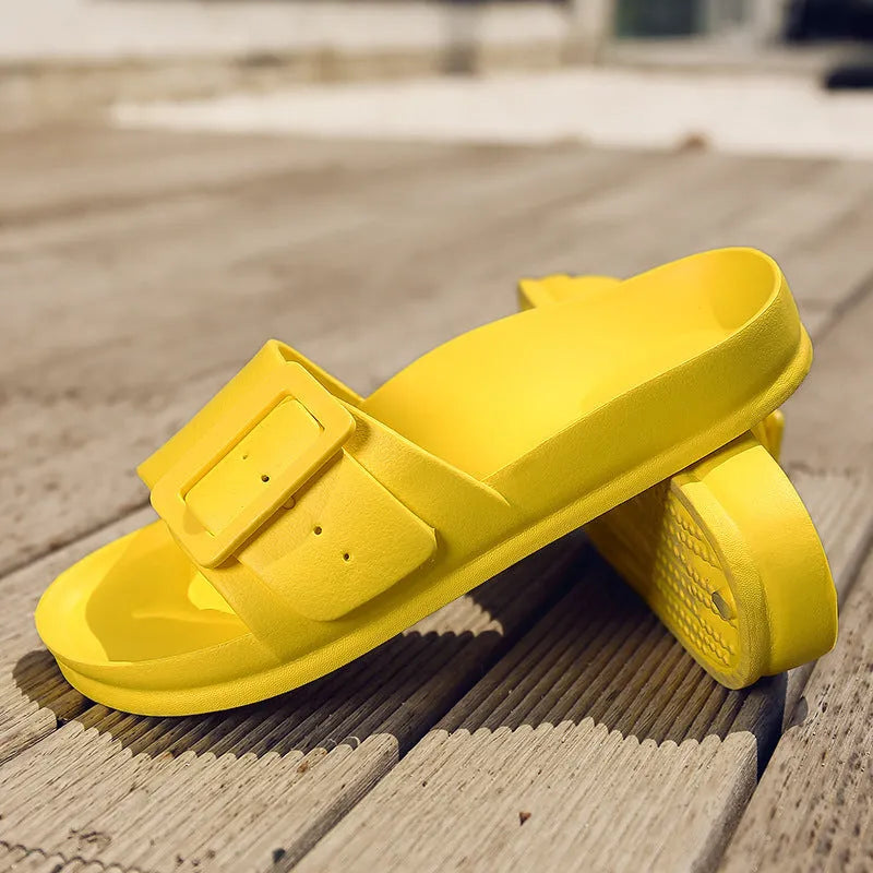 Women's grey blue EVA buckle slipper sandals on a white background.