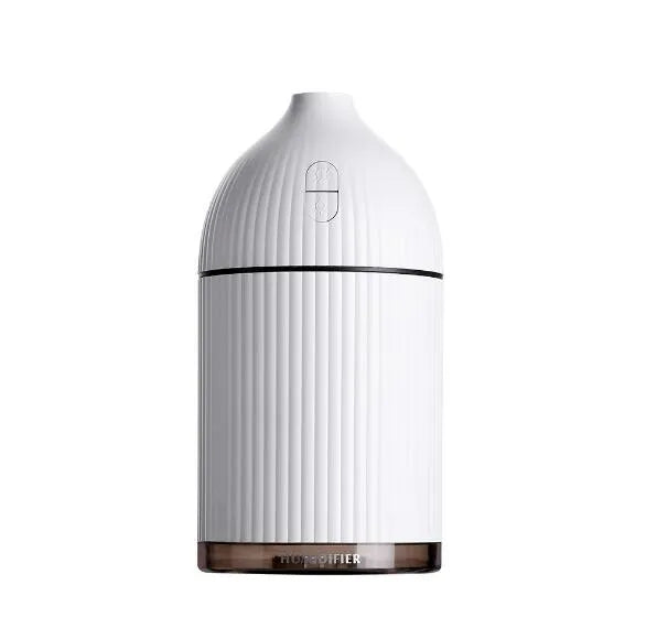White ultrasonic aromatherapy diffuser with LED light, 300ml water tank, and USB cable.