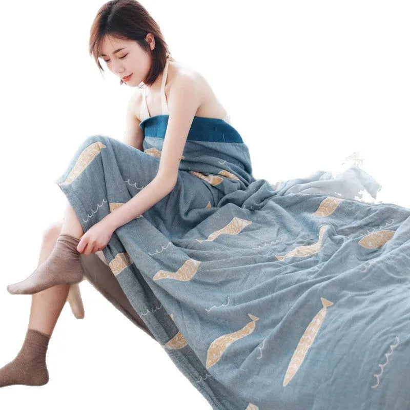Five-layer thickened pure cotton gauze bed blanket in Roulette Wheel Blue pattern on bed