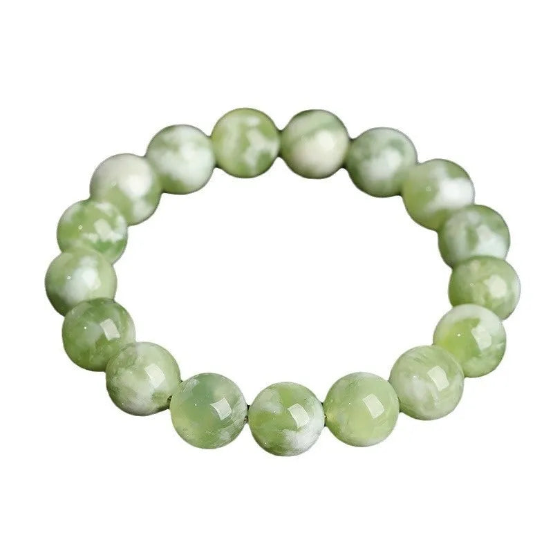 Green milk-in-water Xiuyan jade bracelet with geometric beads in single circle design