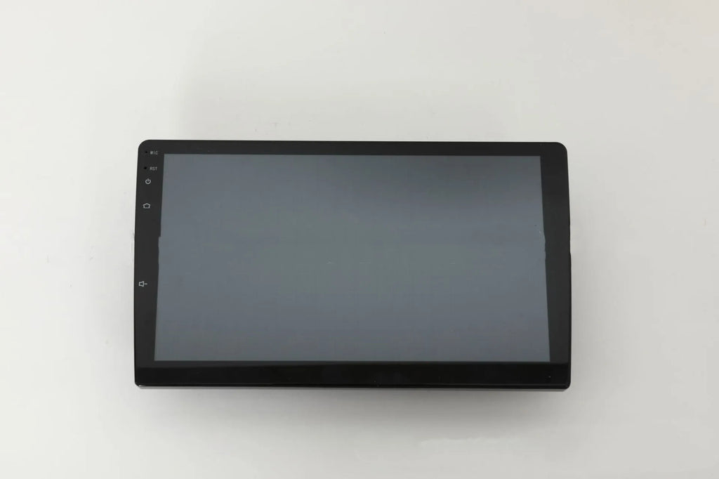 Black universal 10.1 inch Android car stereo head unit with touchscreen on a dashboard