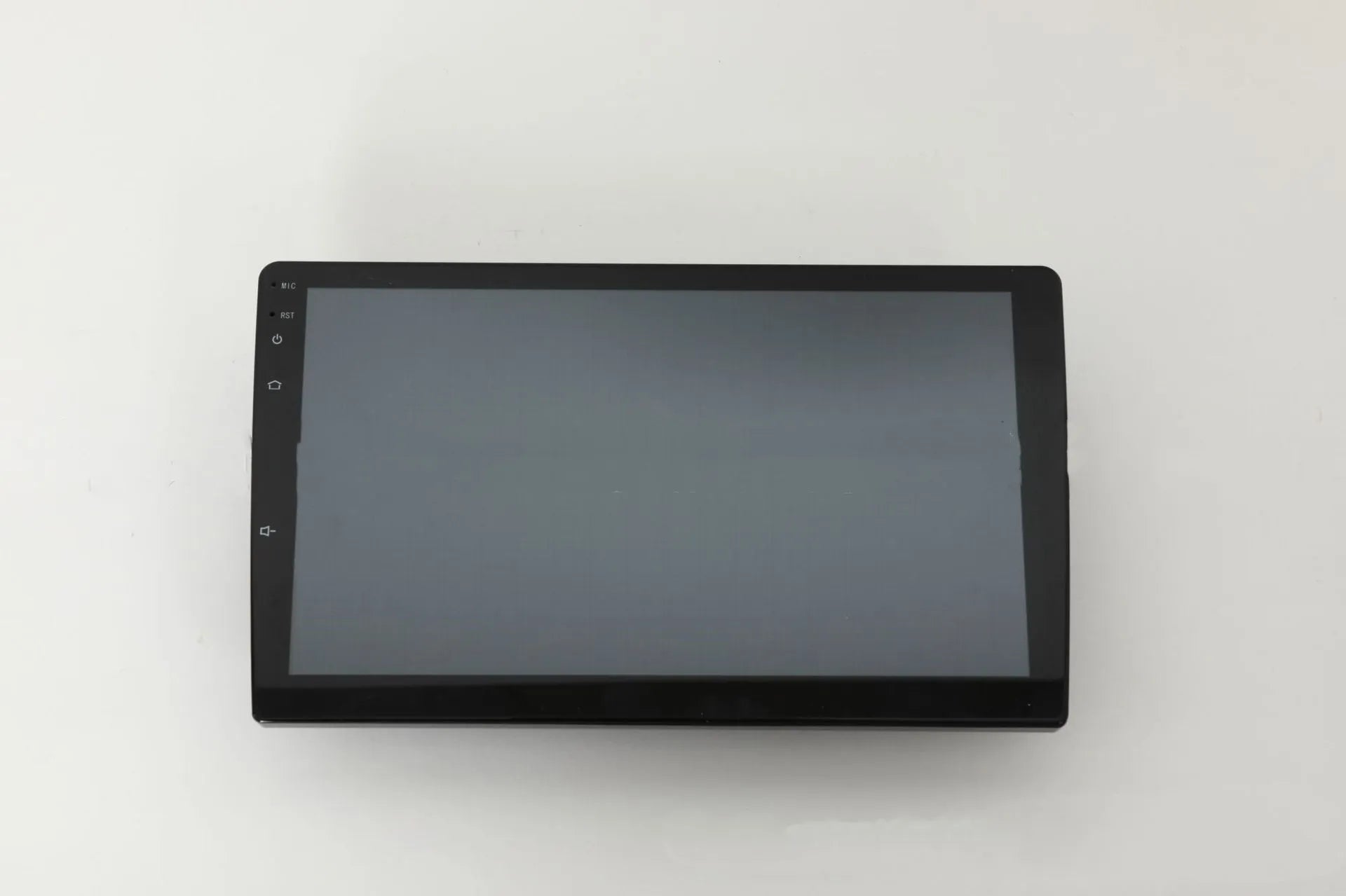 Black universal 10.1 inch Android car stereo head unit with touchscreen on a dashboard