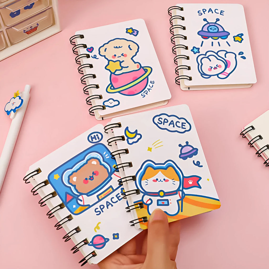 Astronaut flipped portable pocket flipper notebook showing space-themed cover designs at 10.5cm by 8cm