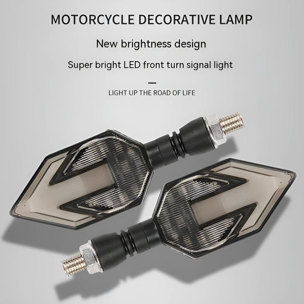 Arrow-shaped LED motorcycle turn signal indicator light with 12V connector.