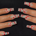 French-style red diamond and small cherry design nail art armour sheets and glue tube.