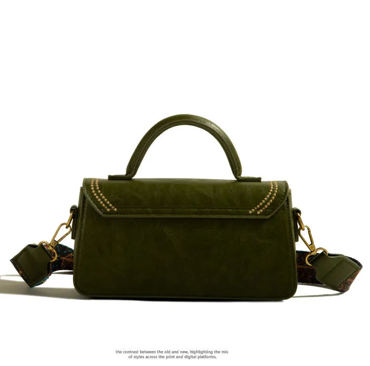 PU leather messenger bag in square vertical shape with sandwich pocket and interior organisation compartments
