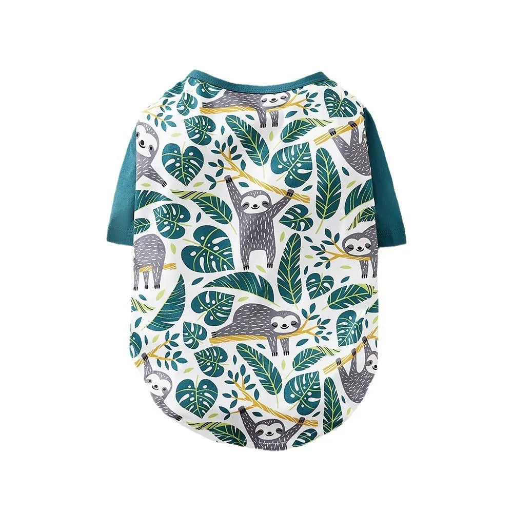 Printed full-body dog t-shirt for a small breed dog, shown in a casual setting.