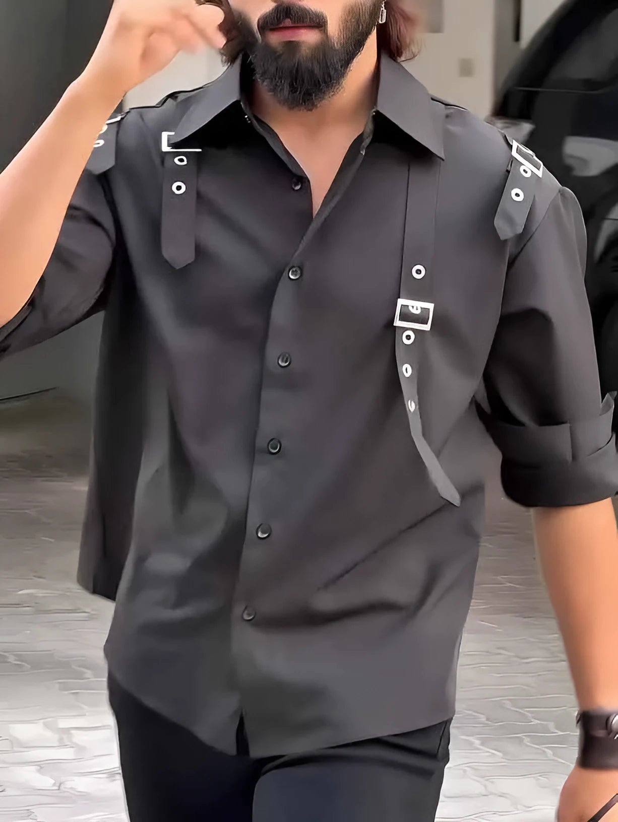 Men's black utility style polyester button up shirt on a hanger