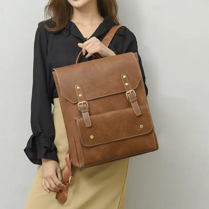 Retro-style soft PU backpack in brown colour, showing front design and straps.