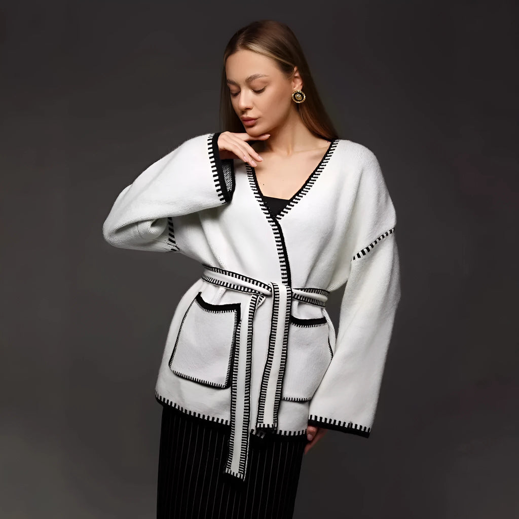 White lace-up knitted cardigan sweater coat with long sleeves and mid-length design
