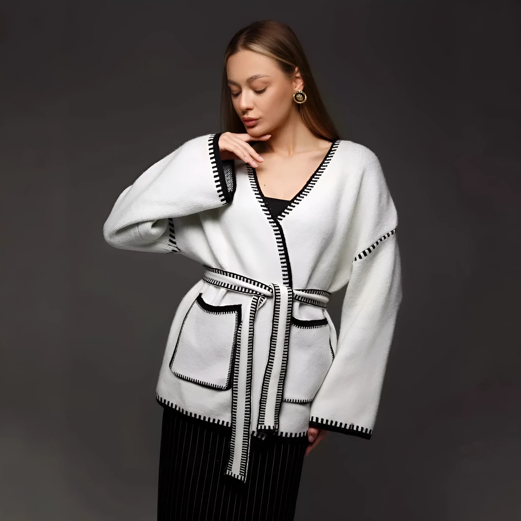 White lace-up knitted cardigan sweater coat with long sleeves and mid-length design