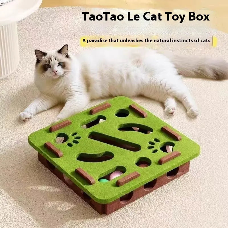 Green brown felt cube cat toy with holes for pet play and boredom relief.