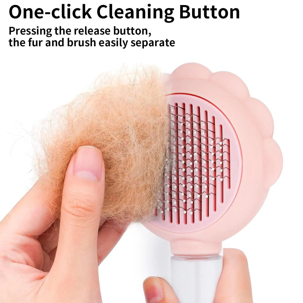 Self-cleaning spray cat brush with release button in grey, green, or pink colours for pet grooming