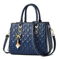 Women's simple shoulder messenger bag in green, dark blue, black, pink, or gold with large capacity and internal compartments