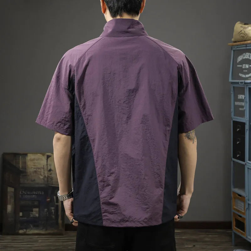 Men's brown ice silk business shirt with half zip stand collar and short sleeves showing loose fit design