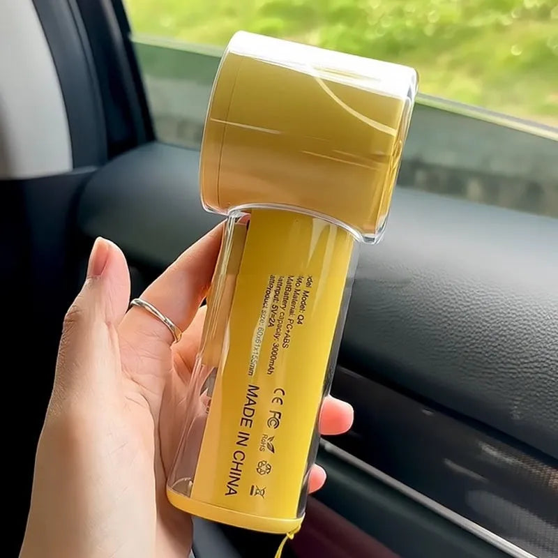 Handheld personal fan with refrigeration function in yellow, white or black colours