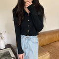 Long sleeve knitted cardigan in viscose fibre showing loose fit and available in beige, black, oatmeal, green, and khaki colours