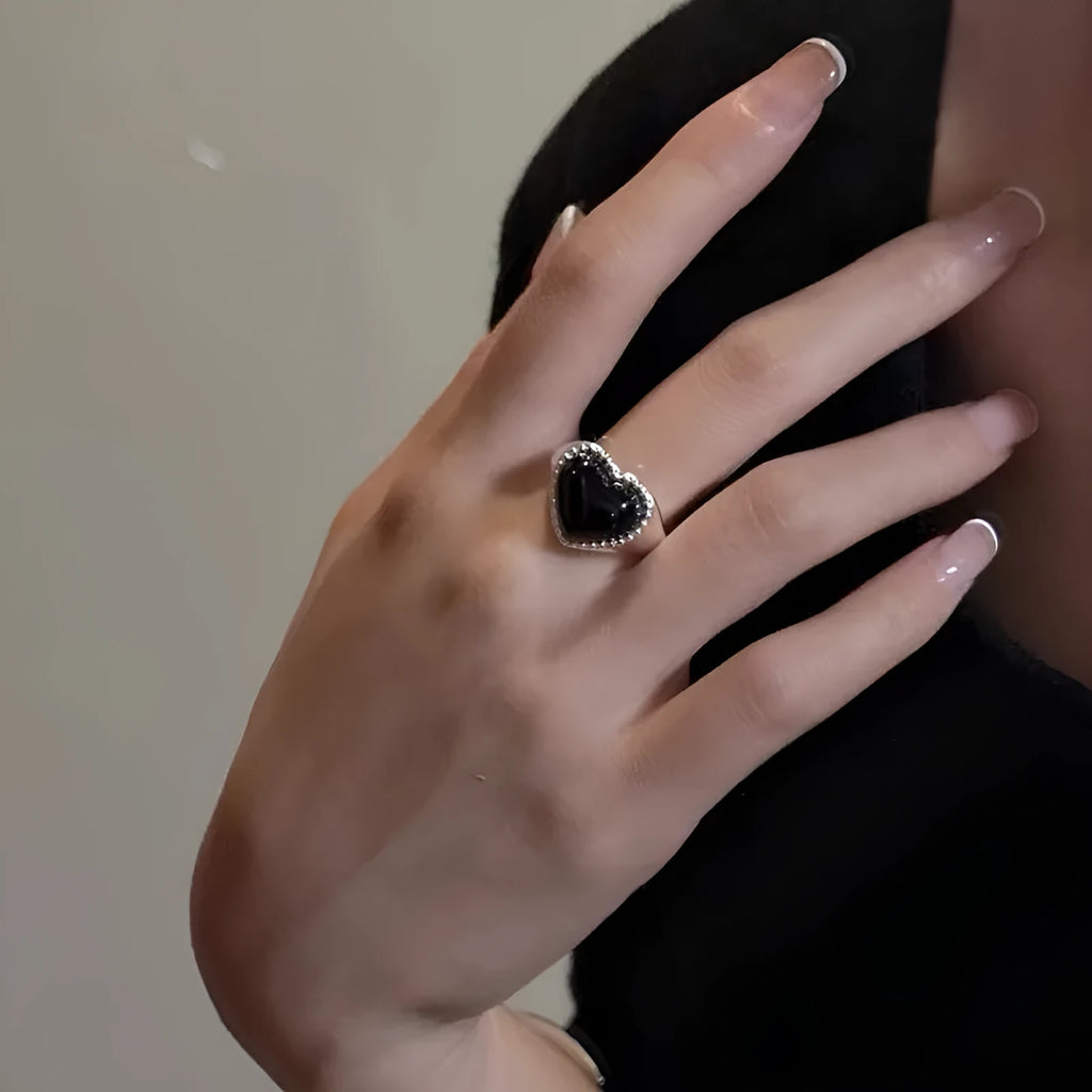 Adjustable S925 sterling silver ring with black agate heart design