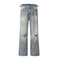 Man wearing blue retro-style distressed straight-leg cotton blend jeans.