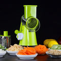 Mandoline slicer vegetable cutter with three stainless steel blades and suction base