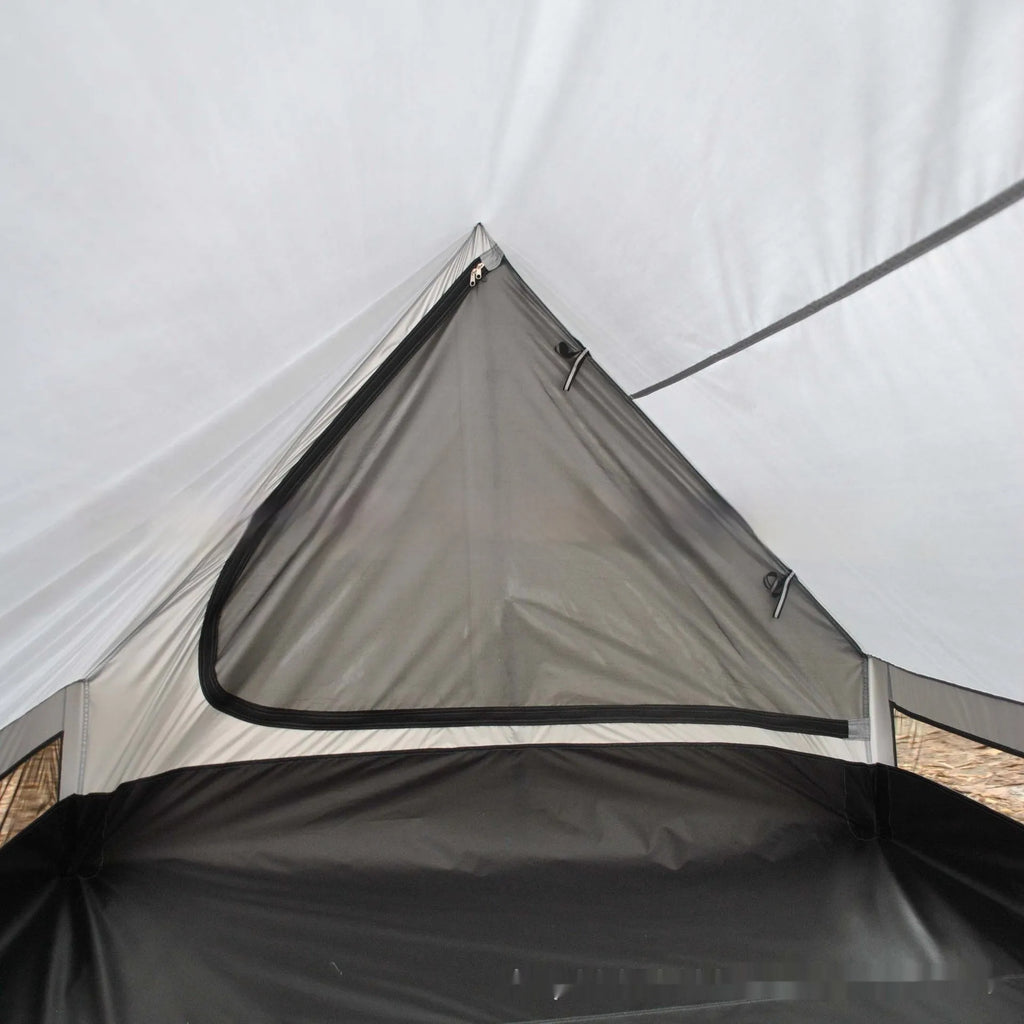 Brown A-line hiking tent erected with hiking poles showing spacious interior for 2-3 people