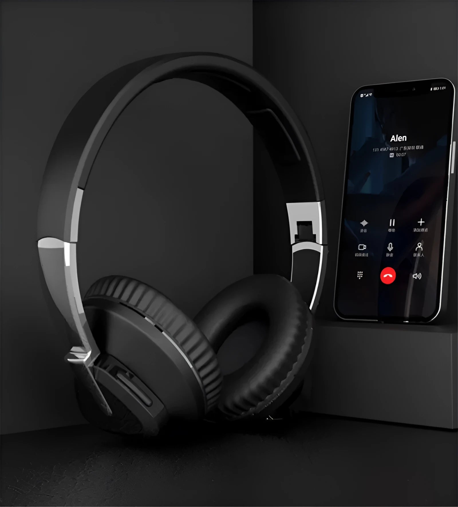 Wireless Bluetooth over-ear headphones in black colour with all-inclusive ear design showing AUX port and control buttons