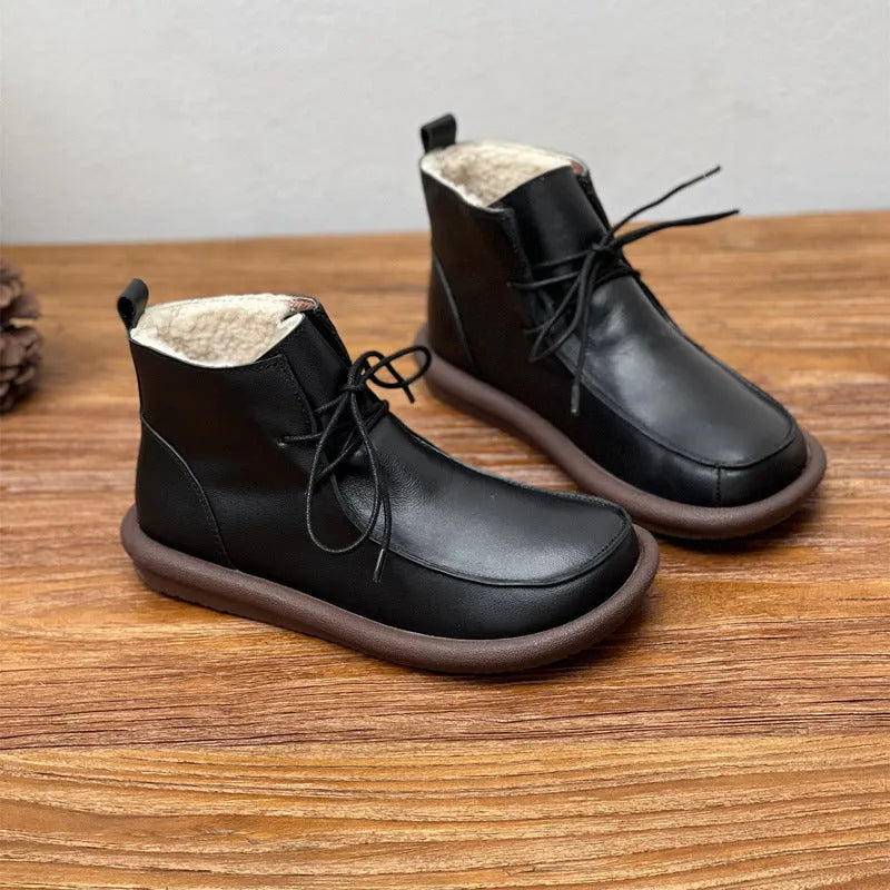 Women's cowhide casual boots with round toe and flat heel in black colour option
