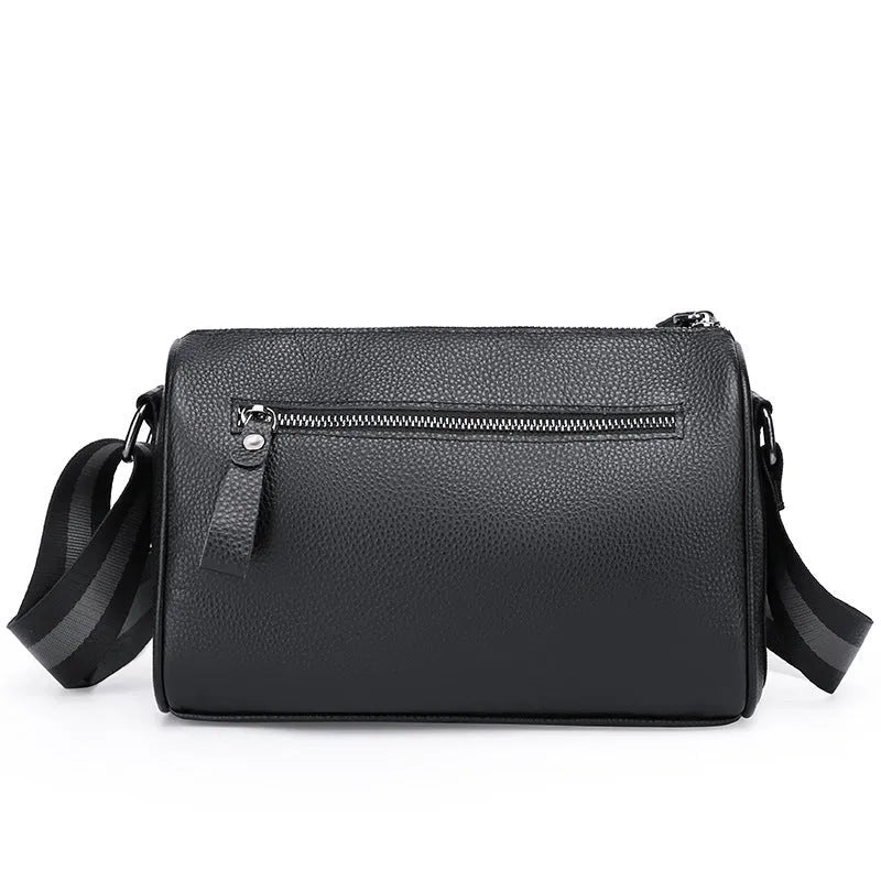 Black genuine leather crossbody shoulder bag showing front view and dimensions