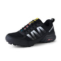 Mountaineering and hiking sneaker with rubber sole and lace-up front in black colour
