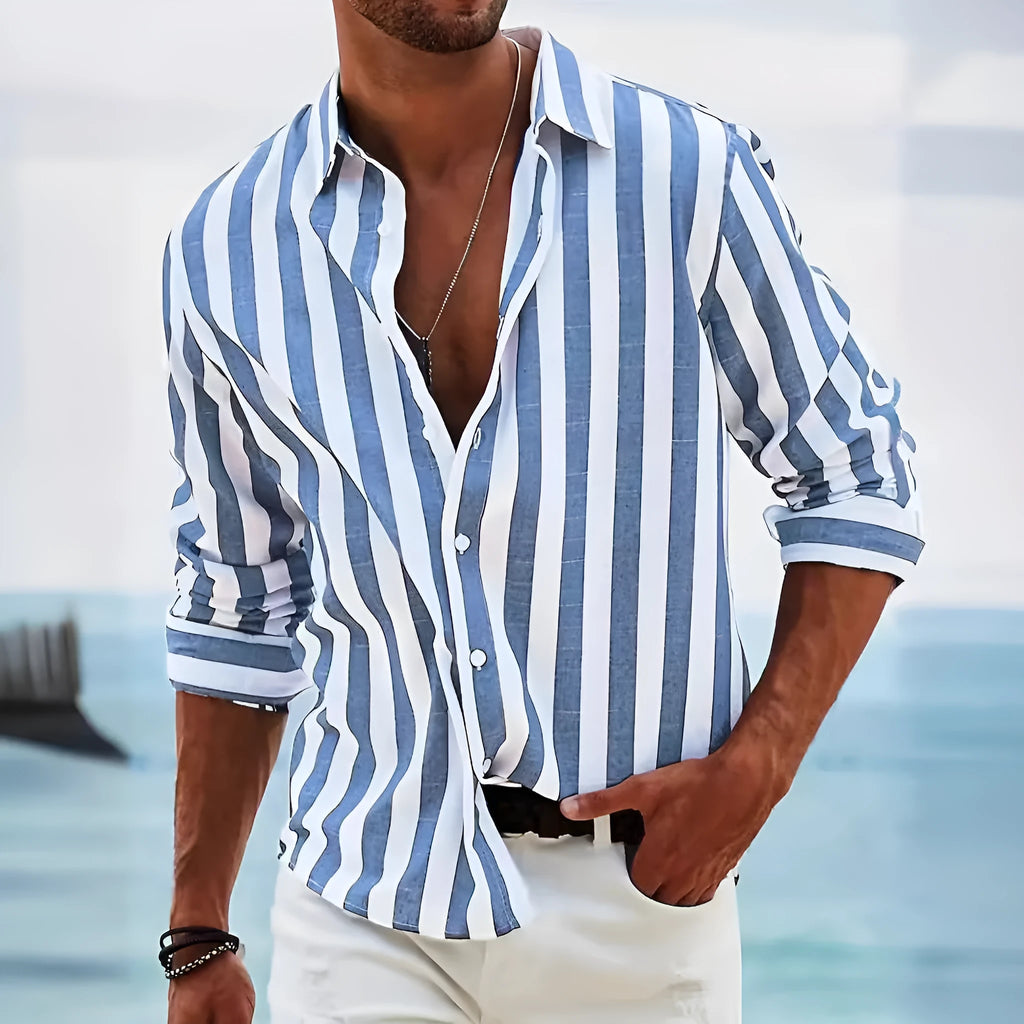 Man wearing a loose fit yarn-dyed striped long-sleeved casual shirt in British cardigan style.
