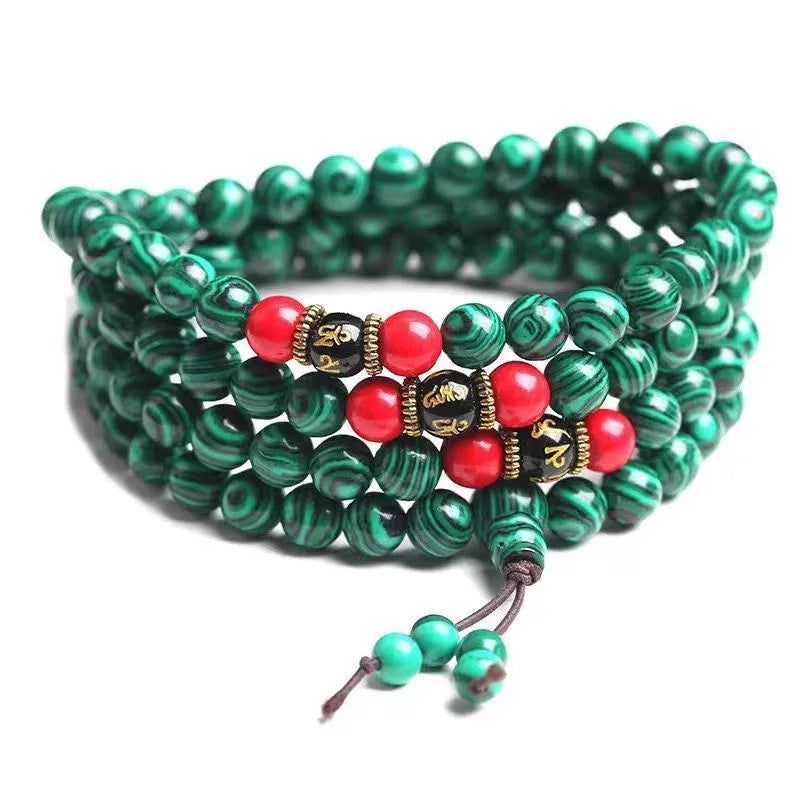 Turquoise Tibetan bracelet with 108 polished round beads on single strand
