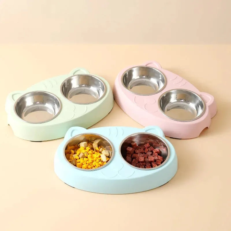 Plastic pet double bowl feeding tray in blue, green, or pink colours measuring 26.5cm long