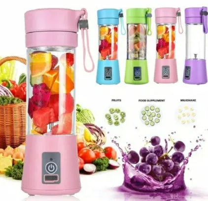 Pink portable USB rechargeable blender with 380ml cup on a table next to fruits.