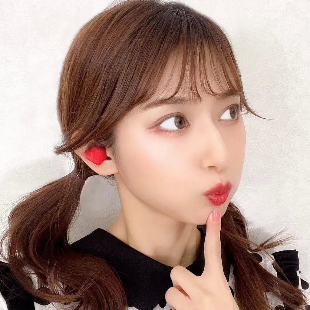 Heart-shaped wireless Bluetooth headphones in Chinese red or girl pink colours with in-ear design