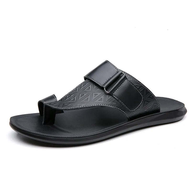 Men's light brown open-toe beach slippers made of cowhide with a rubber sole, shown on a neutral background.