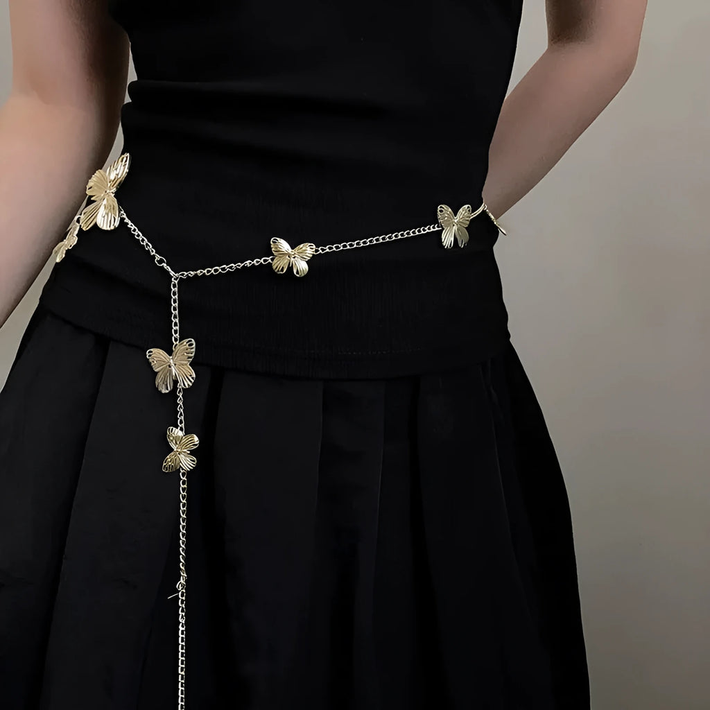 Gold or silver alloy butterfly waist chain measuring 104cm length with 40cm width decorative motif